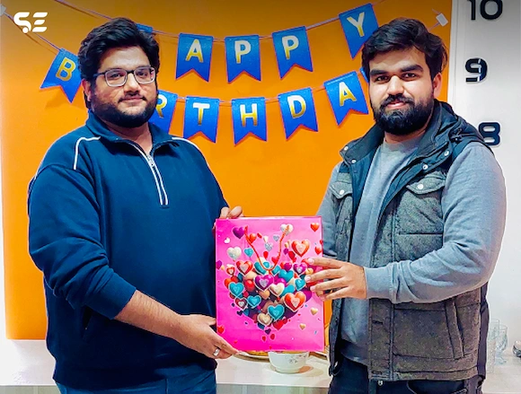 Team member receiving birthday surprises during Team Birthdays event in 2024.