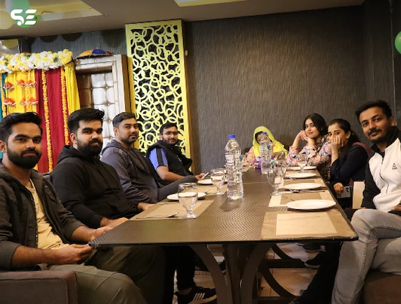 Team members seated for dinner at Soft Enterprise Team Dinner event on 15 February 2025