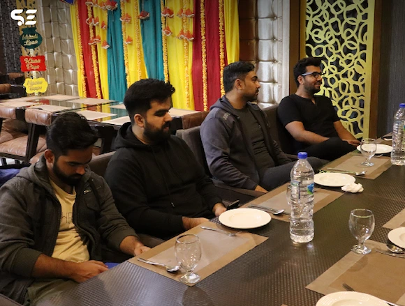 Team members seated for dinner at Soft Enterprise Team Dinner event on 15 February 2025