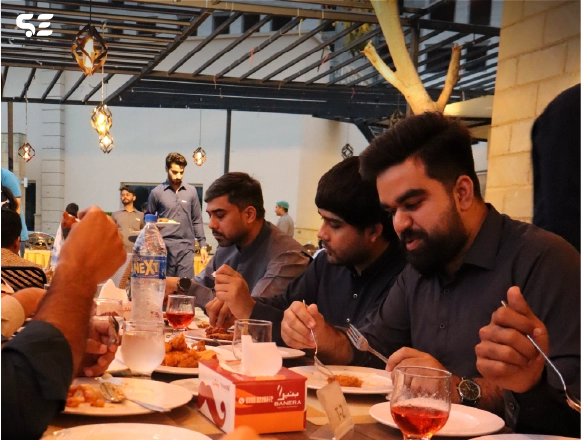 Soft Enterprise team enjoying their meal together at the Annual Iftar event in March 2025