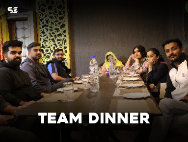 Team enjoying a dinner together during Team Dinner event.