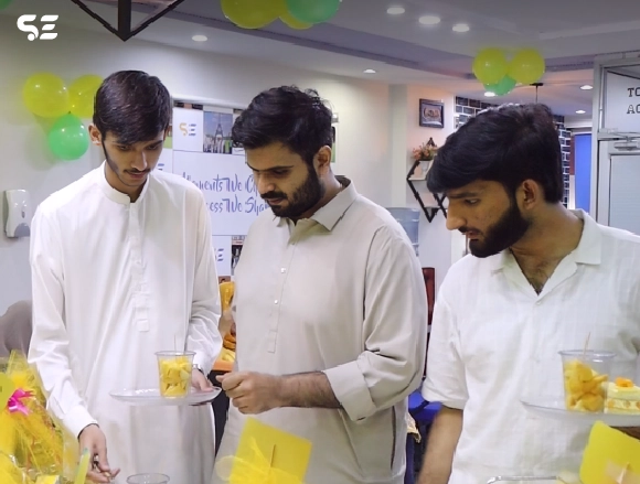 Colleagues having fun during Mango Day.