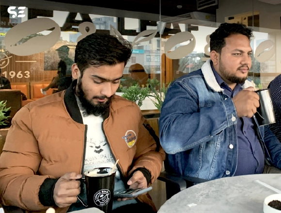 Casual team interaction at Soft Enterprise CBTL hangout.