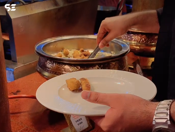 Soft Enterprise employees' farewell celebration with food.