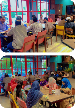 Employees participating in a company gathering for dinner