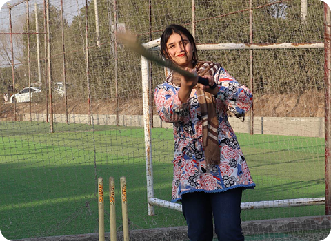 Employee playing cricket on a casual game day