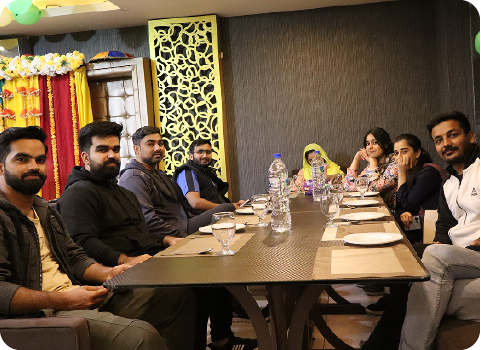 Team members seated for dinner at Soft Enterprise Team Dinner
