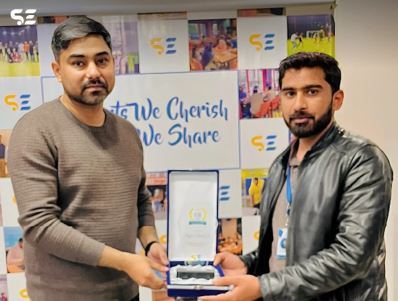 Soft Enterprise honoring Umar Haseeb on his first work anniversary for consistent performance, commitment, and professional excellence.