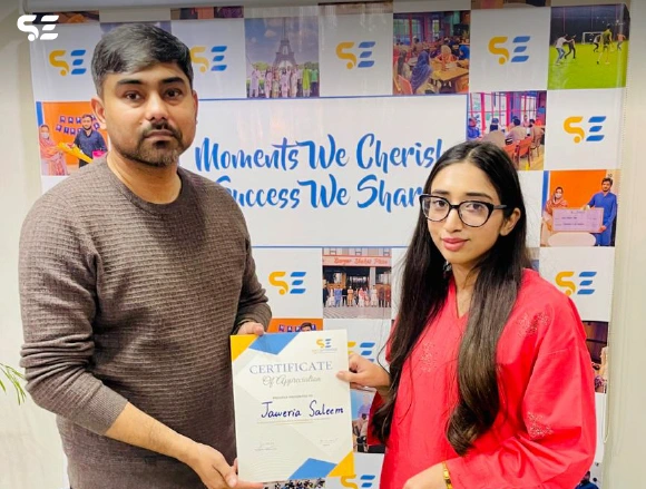 Soft Enterprise employee being recognized for outstanding performance at the awards ceremony.