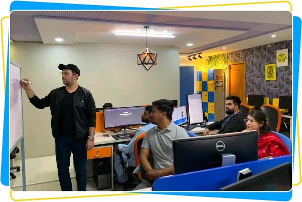 Soft Enterprise team reviewing project strategy in the workspace