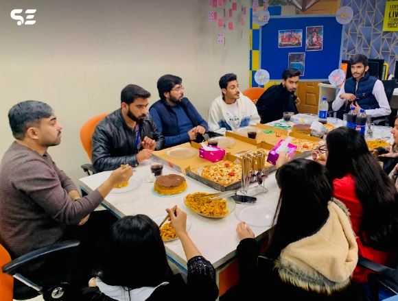 Soft Enterprise team enjoying a team dinner gathering.