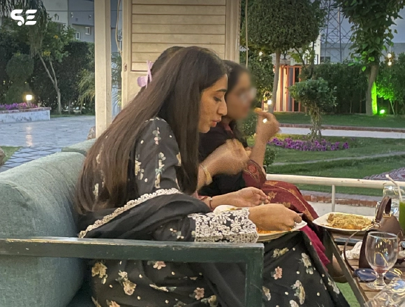 Two female colleagues sharing a meal together