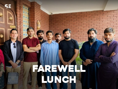 Group photo of employees at a farewell lunch event