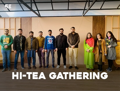Soft Enterprise team members at an indoor Hi-Tea gathering
