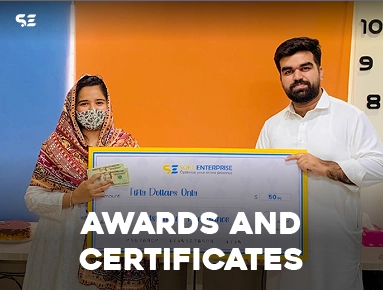 Female employee receiving an award certificate from a colleague