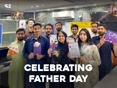 Colleagues gathered together celebrating Father's Day