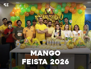 Group of employees posing together at Mango Fiesta 2026